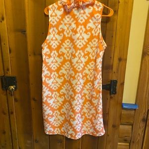 Breezy, lightweight, looks orange in pictures but the real color is more salmon